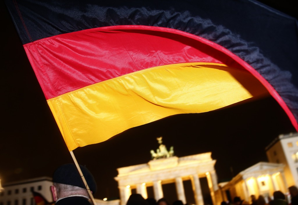 A member of BAERGIDA, Berlin's section of anti-immigration movement Patriotic Europeans Against the Islamisation of the West (PEGIDA) demonstrates in front of the Brandenburg Gate in Berlin